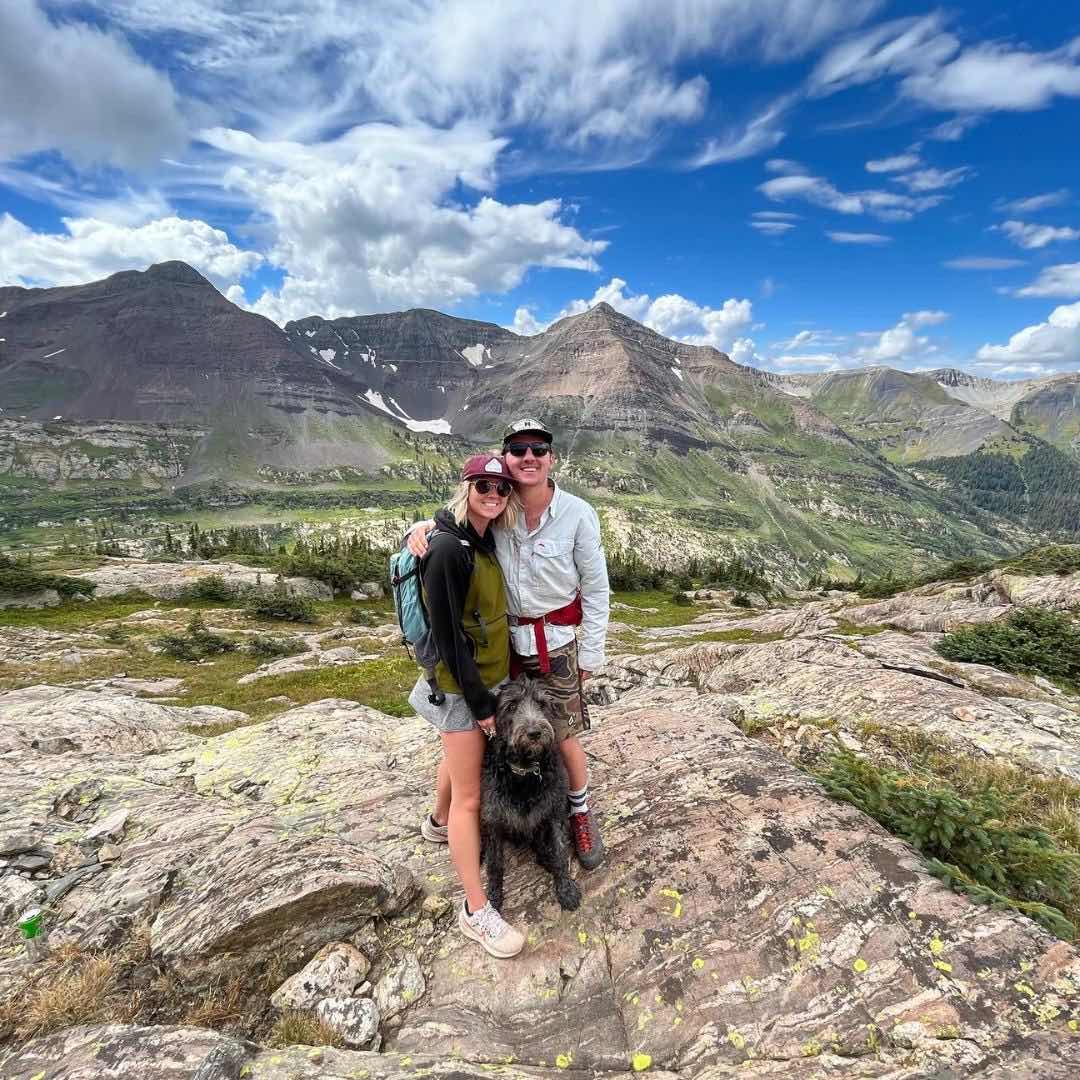 Jessica, her husband Tj, and dog Steve on a hike.