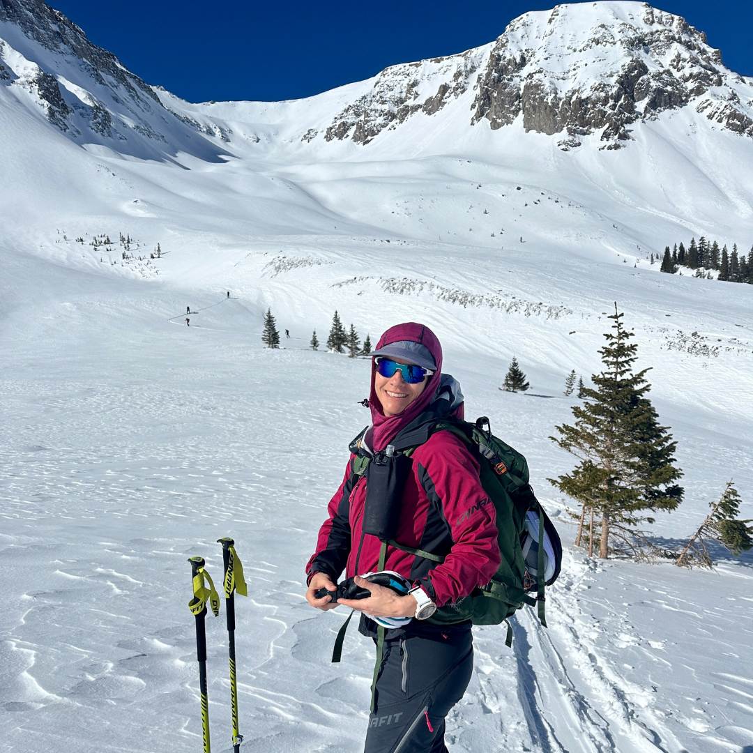 Aimee backcountry skiing.